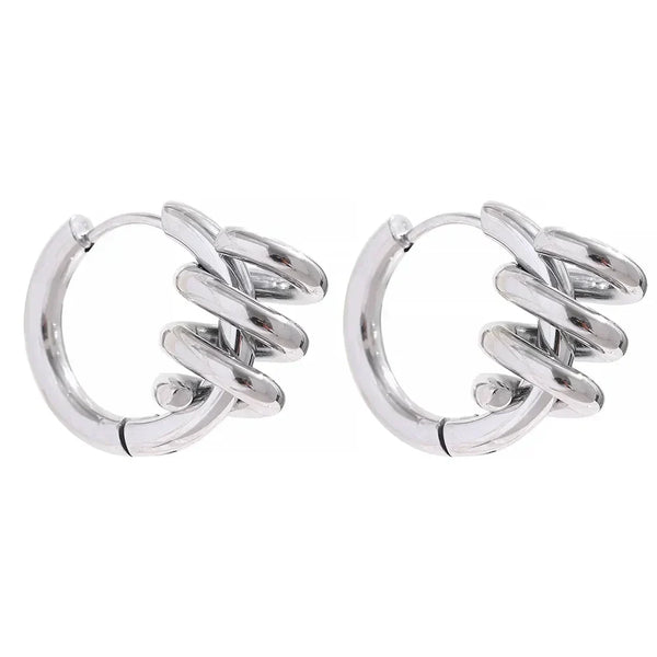 Pair of 925 silver hoop earrings with spiral design on white background