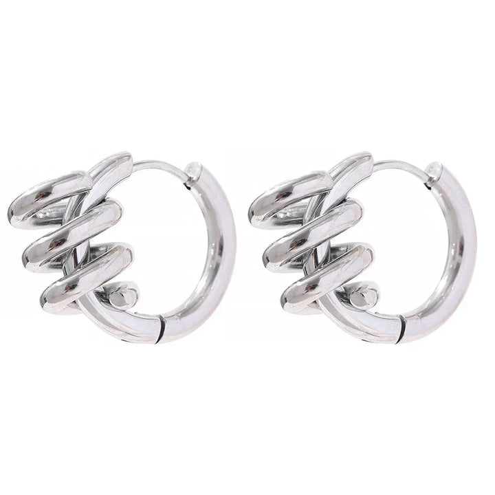 Pair of silver hoop earrings on a white background