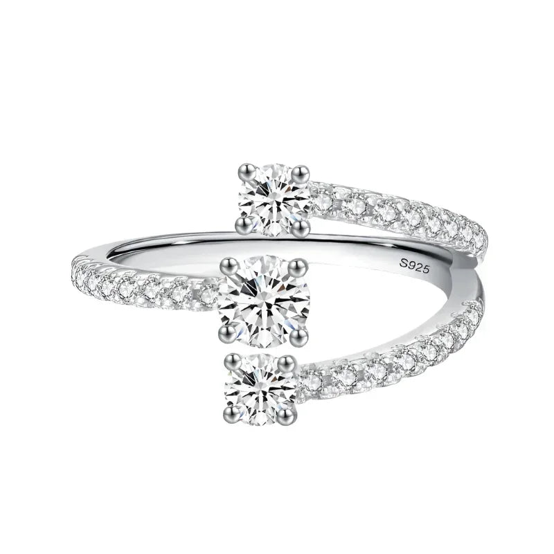 Sterling silver open ring with two round-cut cubic zirconia and pavé accents